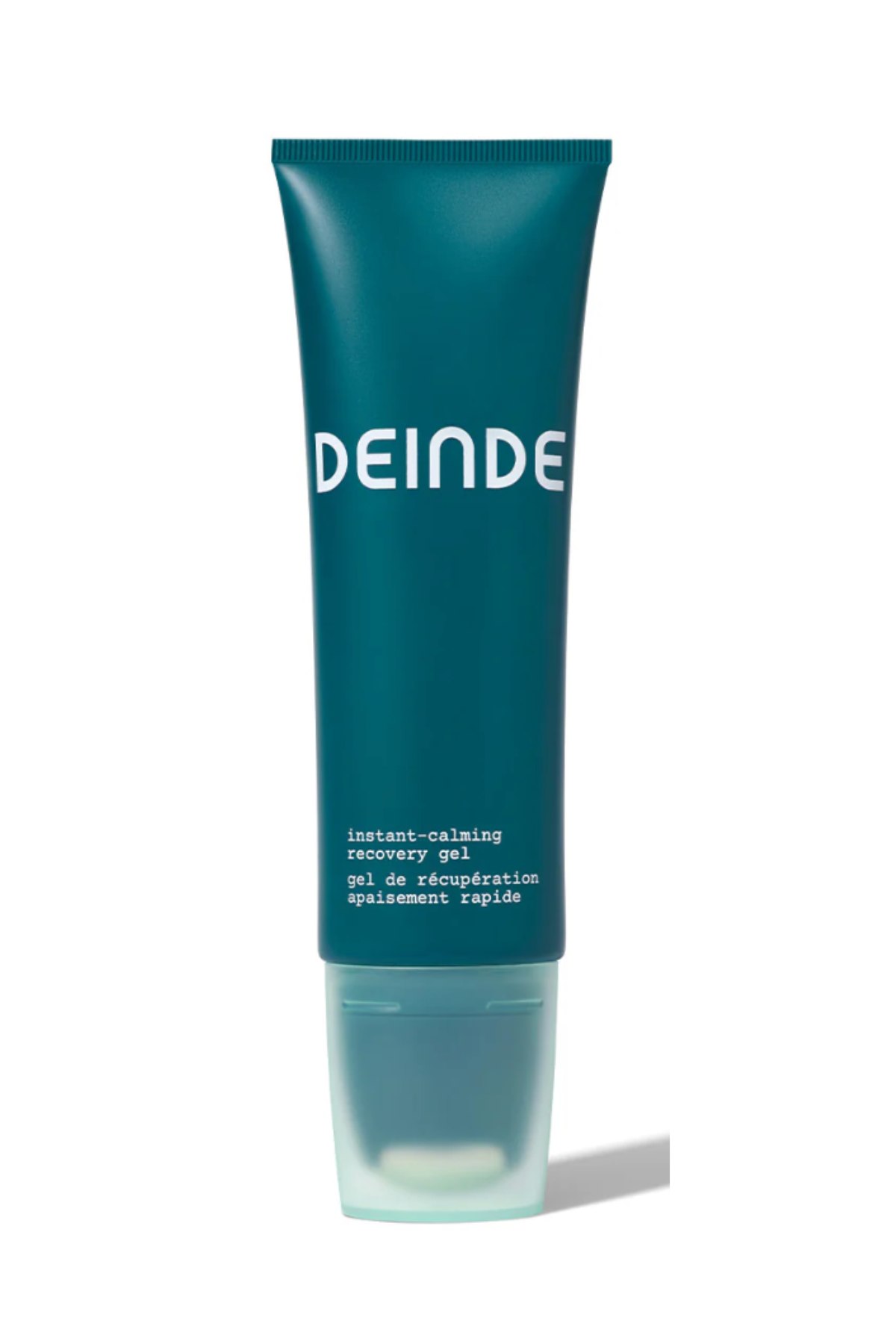 a dark green bottle with white text on a white backdrop