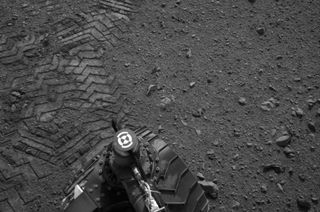 Curiosity's tracks on Mars spell out "JPL" in Morse code.