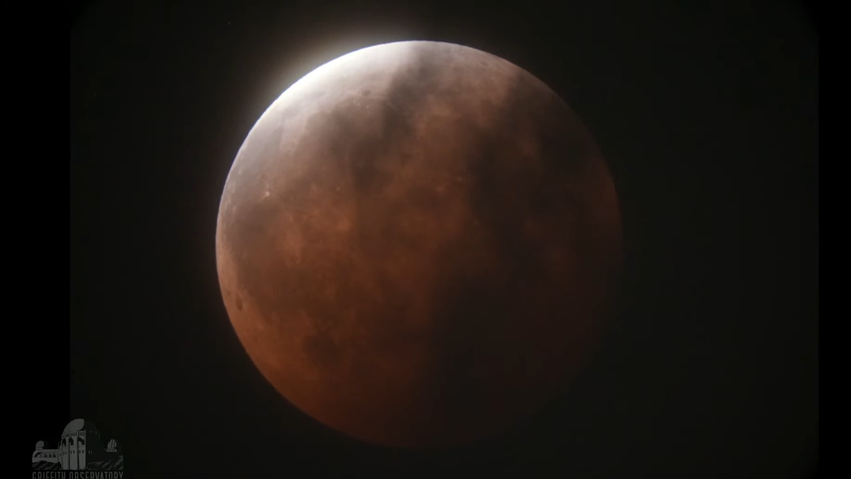 The full moon on May 26, 2021, just as totality of the lunar eclipse was ending, as seen from Griffith Observatory near Los Angeles.