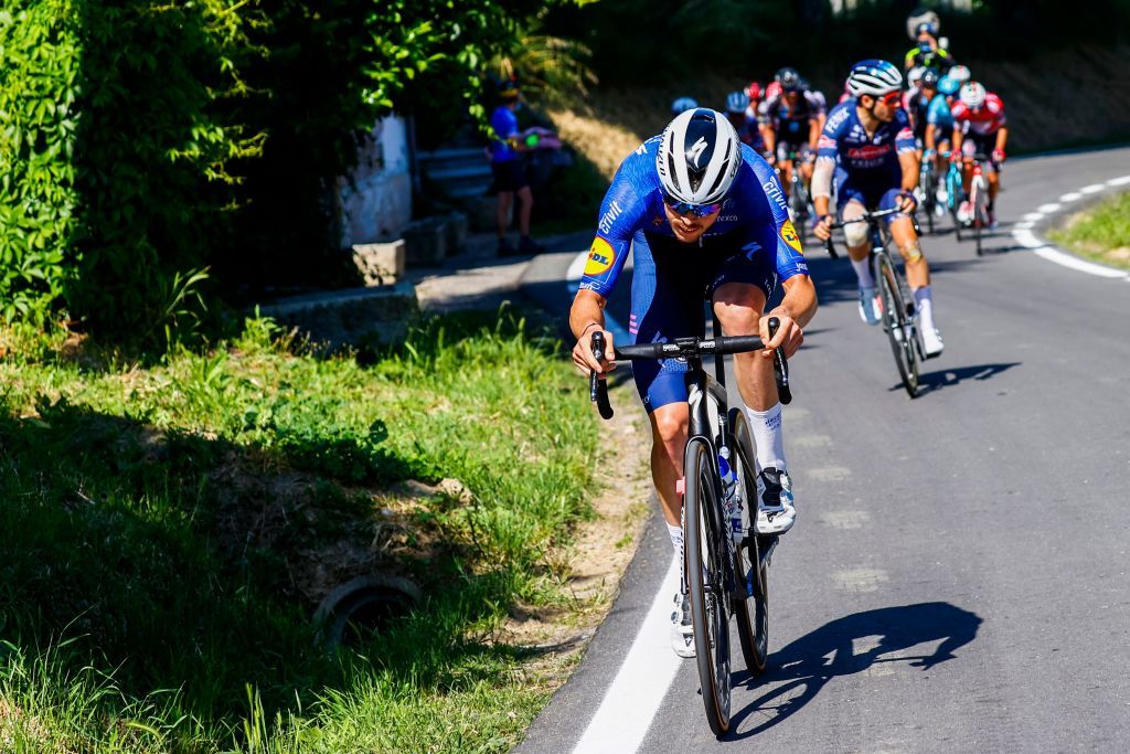Team Deceuninck rider Frances Remi Cavagna attacks in the last 30 kilometers during the 18th stage of the Giro dItalia 2021 cycling race 231km between Rovereto and Stradella on May 27 2021 Photo by Luca Bettini AFP Photo by LUCA BETTINIAFP via Getty Images