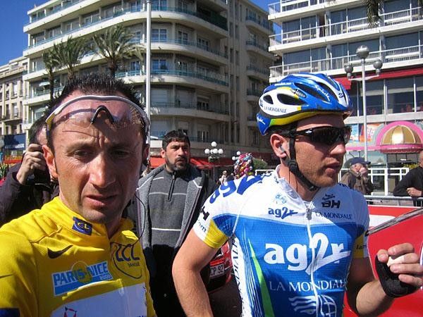 Yellow jersey Davide Rebellin (Gerolsteiner) and his closest rival who is only one touch away. Three seconds ain't much!