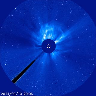 A massive solar eruption, called a coronal mass ejection, can be seen blasting out from the sun's surface after powerful X1.6-class solar flare on Sept. 10, 2014.