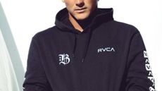 Man wearing a black RVCA hoodie