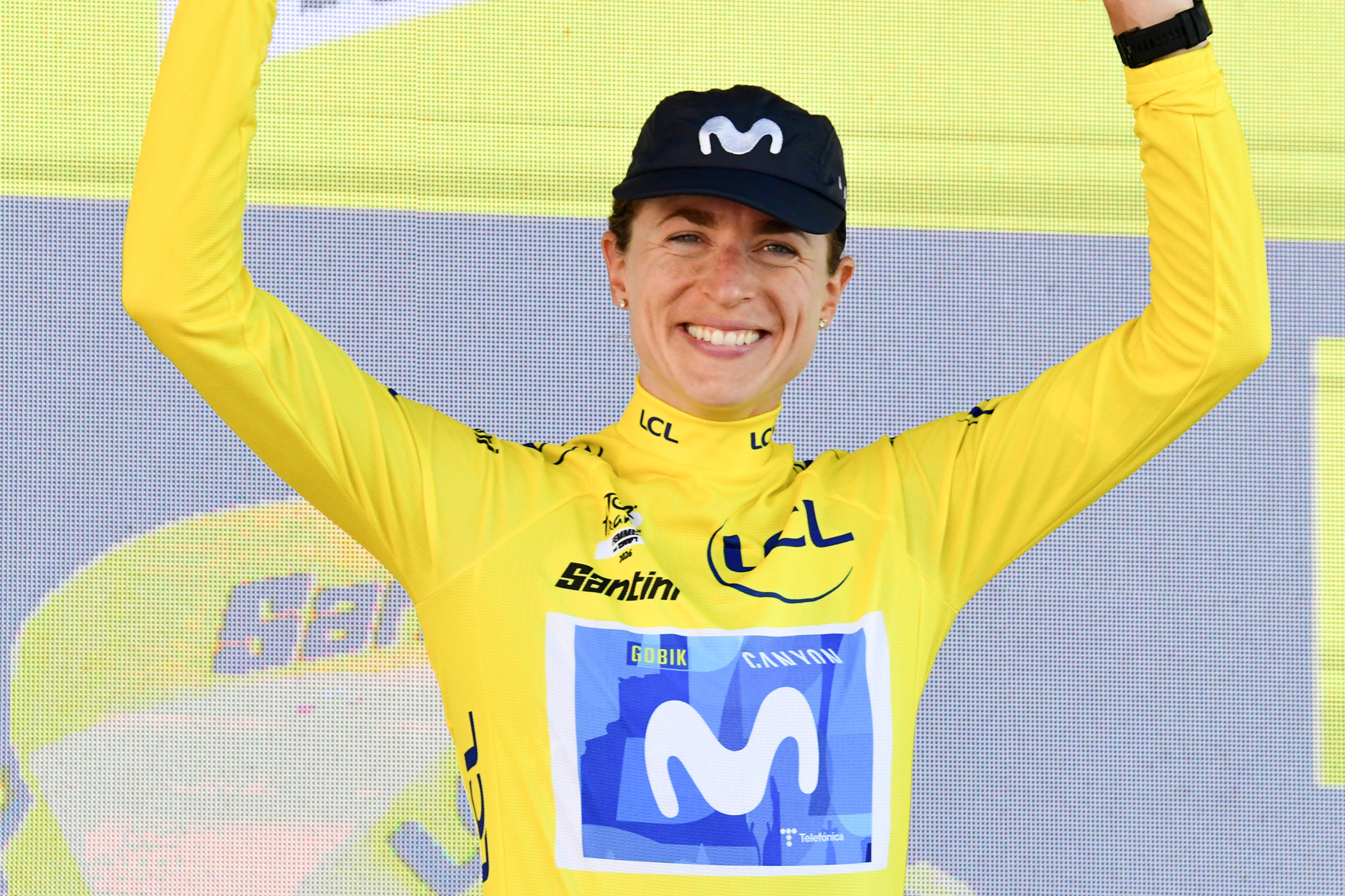 Marlen Reusser wears the Tour de France Femmes yellow jersey as race leader on the podium after stage 6 of the 2026 race