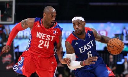 LeBron James tries to drive on Kobe Bryant during the 2013 NBA All-Star game at the Toyota Center on February 17 in Houston.