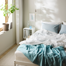 IKEA BL&Aring;NEPETA duvet on a bed
