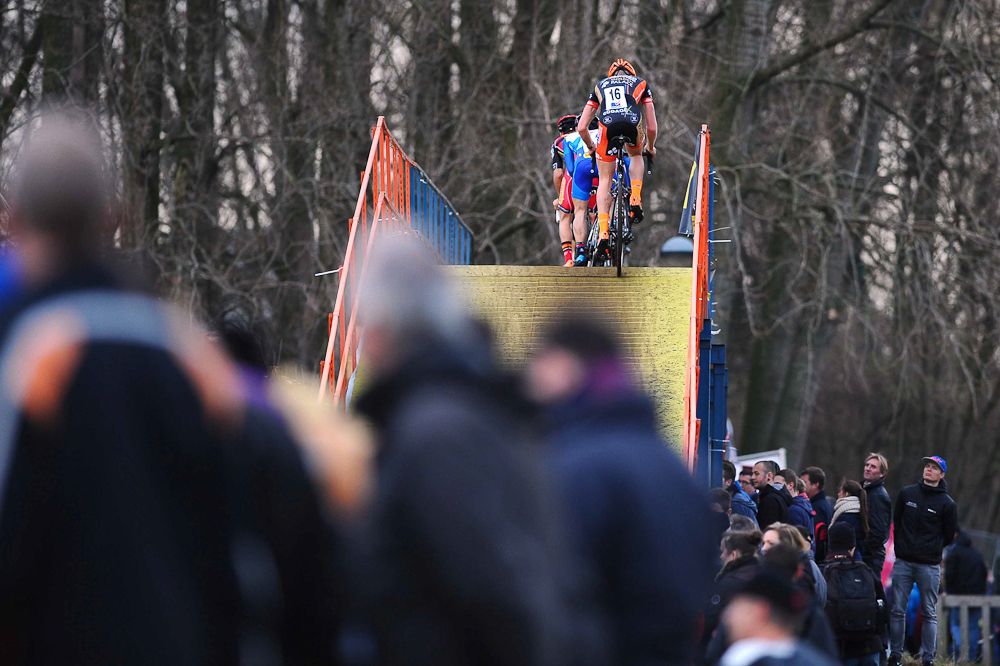 Riders go up the flyover in Loenhout