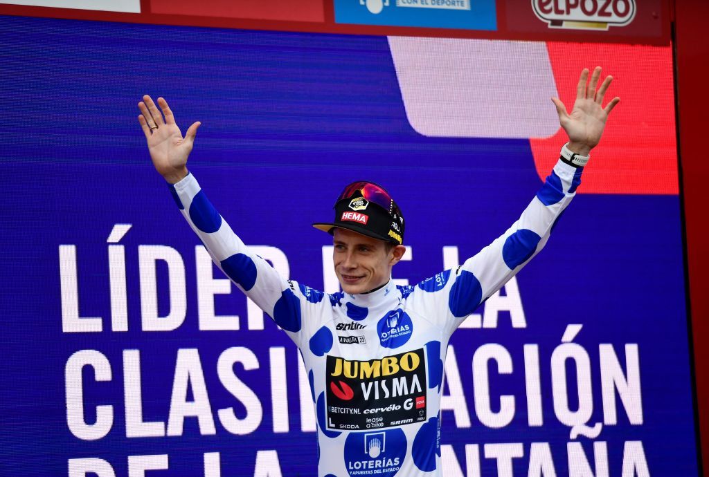 Team JumboVismas Danish rider Jonas Vingegaard wearing the best climbers dotted jersey celebrates on the podium after the stage 13 of the 2023 La Vuelta cycling tour of Spain a 1347 km race between Formigal and the Col du Tourmalet in France on September 8 2023 Photo by ANDER GILLENEA AFP Photo by ANDER GILLENEAAFP via Getty Images