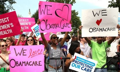 ObamaCare supporters react to the Supreme Court decision to uphold President Obama's health care law on June 28.