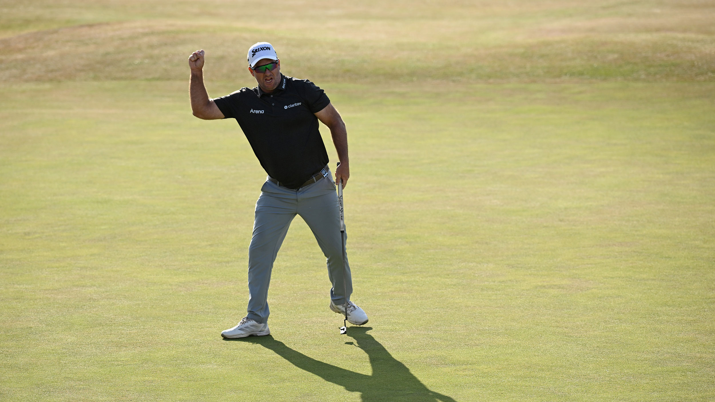 Ryan Fox raises his fist after holing the winning putt at The Open in 2026