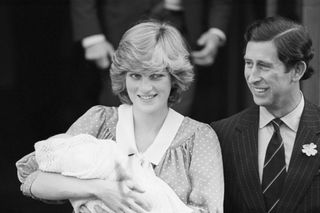 Diana with her newborn son william outside the hospital with Prince Charles