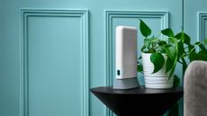 EE Smart Hub 7 Plus on a table in a living room – expanded using generative AI