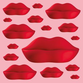 Pink background with different sized red lips