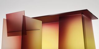 Glass desk and chair with ombre effect in red and yellow by Germans Ermics on show at Rossana Orlandi during Salone del Mobile 2021