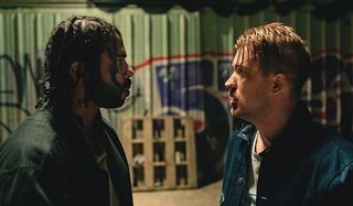 Blindspotting Daveed Diggs Rafael Casal frightened in an alley