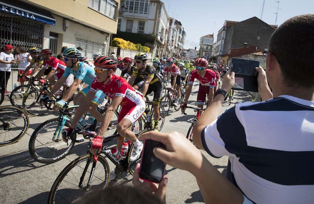The Vuelta a Espana peloton is given a cheer