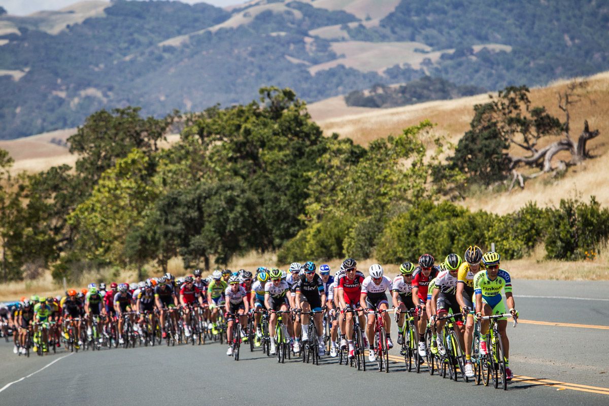 The peloton gets strung out after the first climb of the day