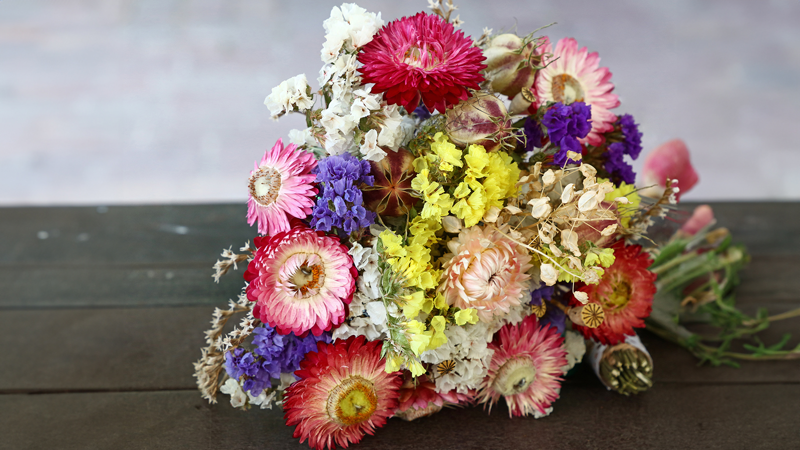 Bunch of dried flowers on table top