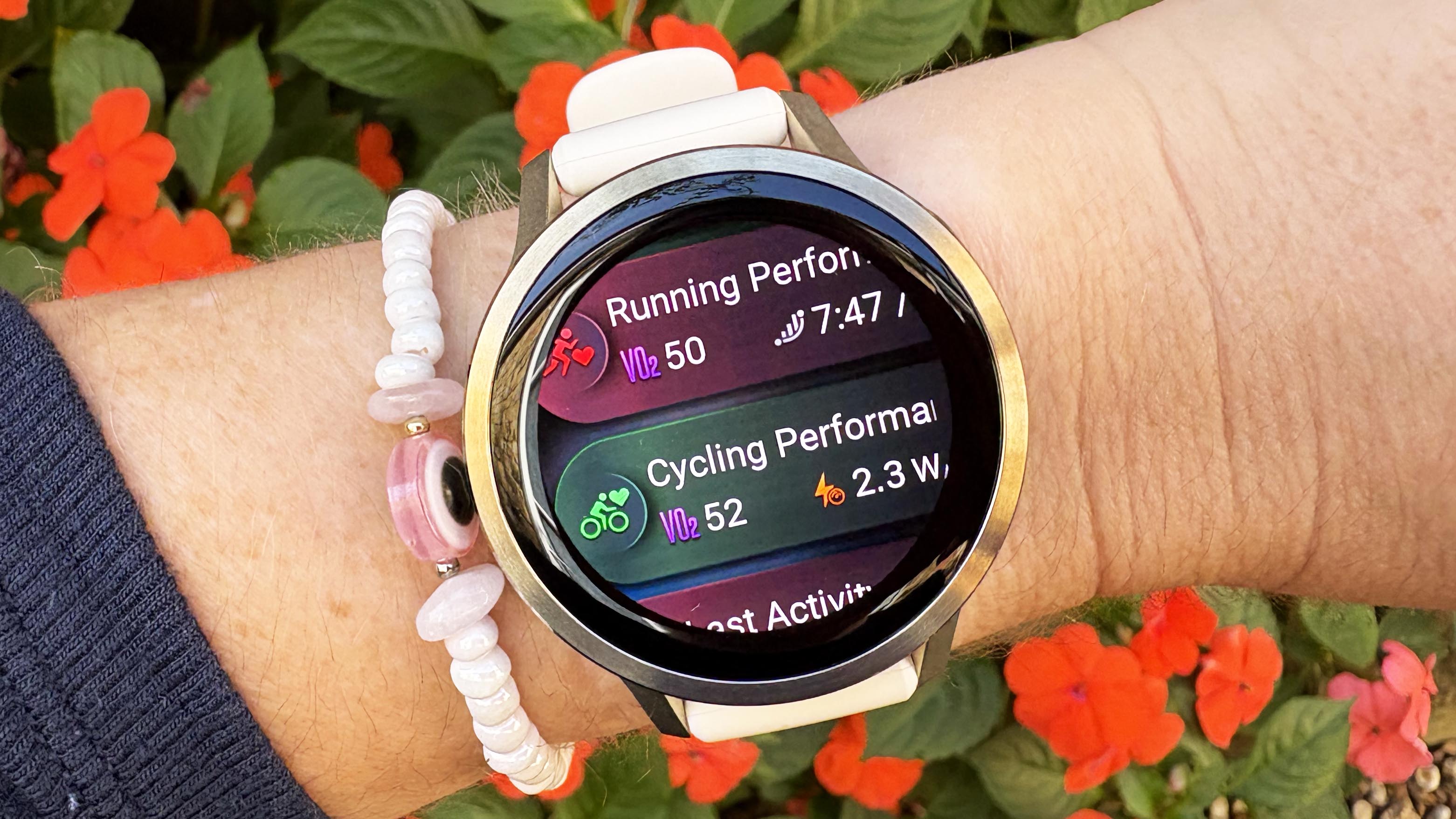 the Garmin Venu 4 in lunar gold on the wrist