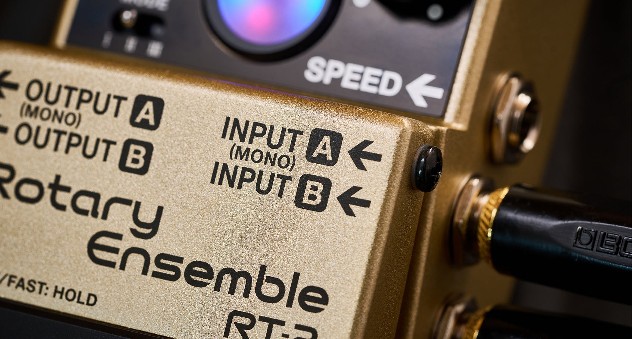 Boss RT-2 Rotary Ensemble: the rotating speaker emulator has a visual reference on front, three modes, mono/stereo outputs and a metallic gold paintjob.