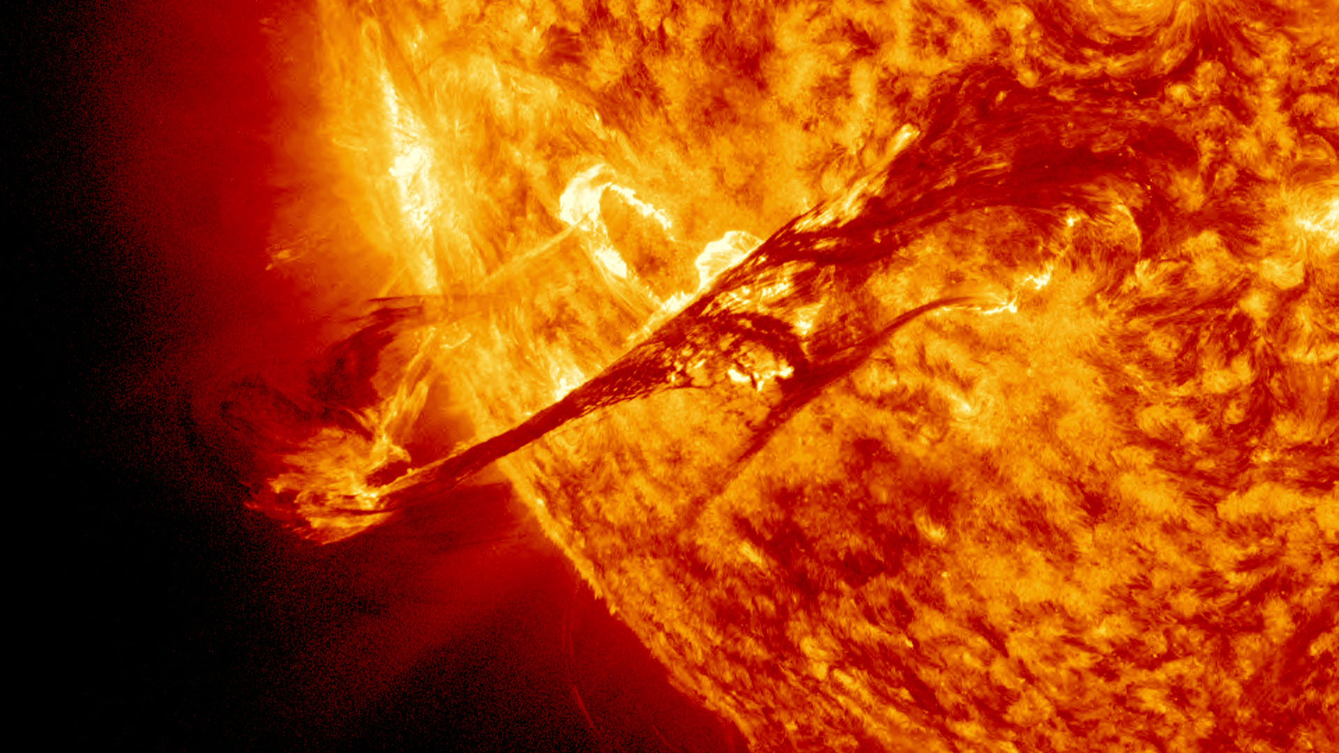 A coronal mass ejection blasts over billion tons of matter into space.