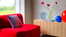 red armchair in modern living space