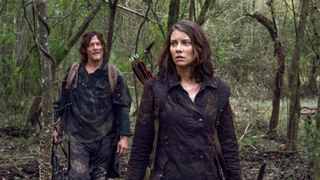 Norman Reedus as Daryl and Lauren Cohan as Maggie in the woods on The Walking Dead