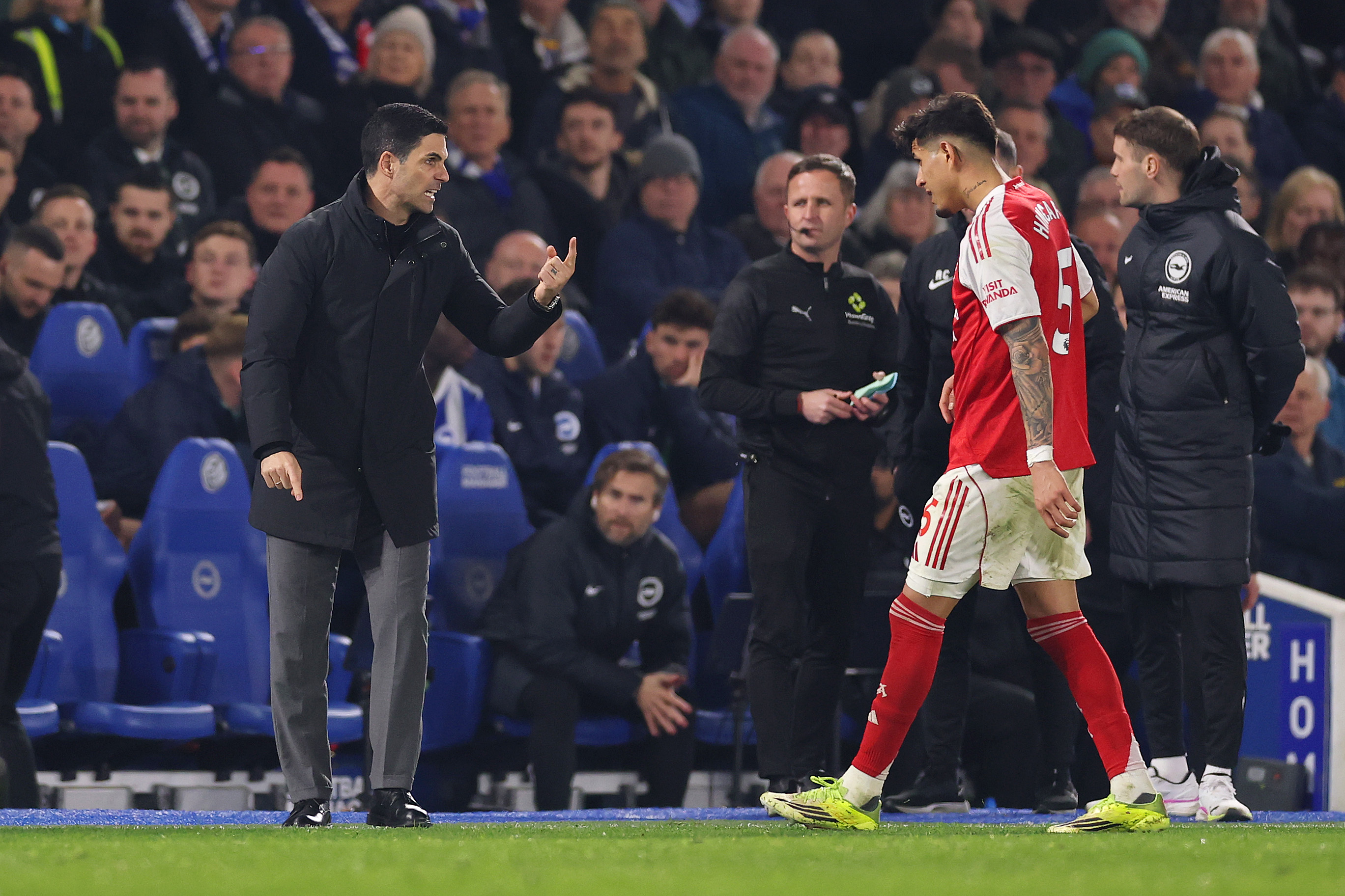 Mikel Arteta, Manager of Arsenal, interacts with Piero Hincapie of Arsenal during the Premier League match between Brighton &amp;amp; Hove Albion and Arsenal at Amex Stadium on March 04, 2026 in Brighton, England.