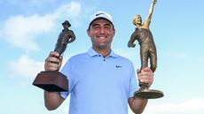 Scottie Scheffler with the Jack Nicklaus Award for Player of the Year and the Byron Nelson Award for recording the lowest Scoring Average of 2023