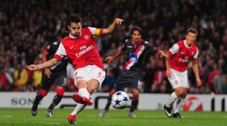 LONDON, ENGLAND - SEPTEMBER 15: Cesc Fabregas of Arsenal scores from the penalty spot during the UEFA Champions League Group H match between Arsenal and SC Braga at the Emirates Stadium on September 15, 2010 in London, England. (Photo by Mike Hewitt/Getty Images)