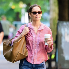 katie holmes wears a red button-up shirt and barrel jeans with velvet mary jane flats while out in nyc