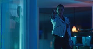 In 'Vanquish,' Ruby Rose plays an ex-convict forced to pick up payments for a ring of corrupt cops after the disabled police officer (Morgan Freeman) she cares for holds her ailing daughter hostage.