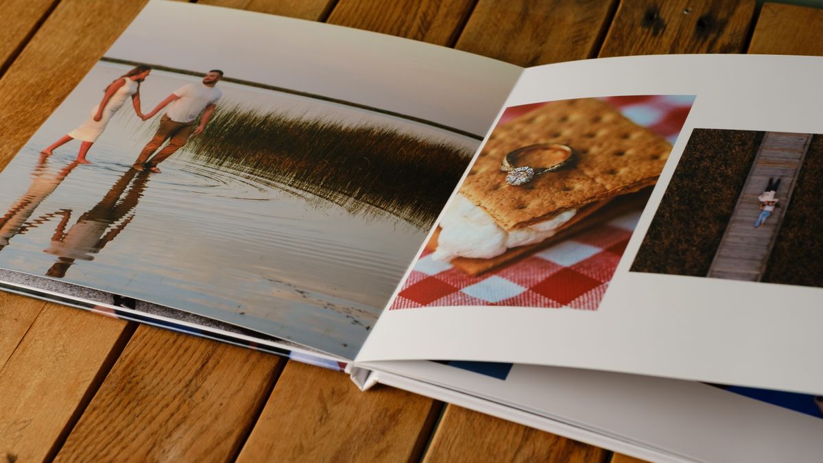 Photo books from Printique on a desktop