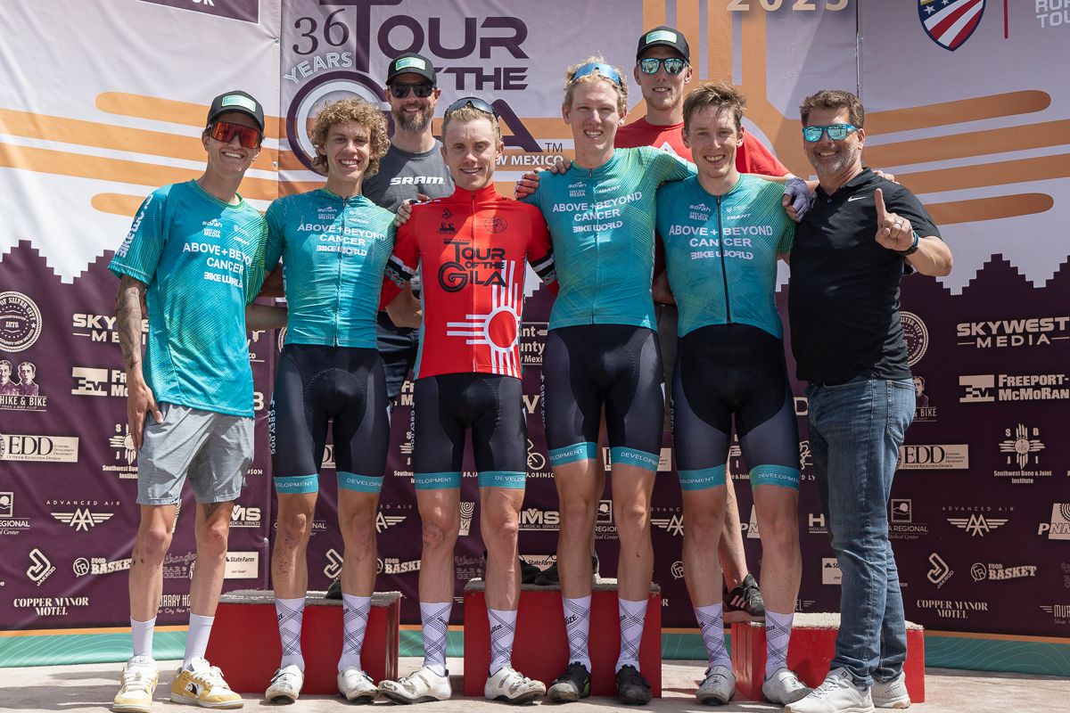 Above and Beyond Cancer cycling team celebrating their GC win