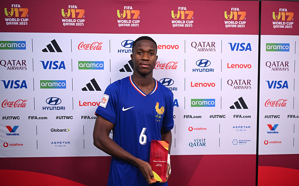 Abdoulaye Camara of France poses for a photo with the player of the match award during the FIFA Under-17 World Cup match between France and Chile at Aspire Academy on November 05, 2025 in Doha, Qatar.