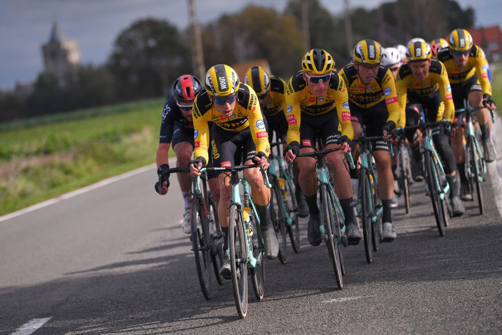 WEVELGEM BELGIUM OCTOBER 11 Owain Doull of The United Kingdom and Team INEOSGrenadiers Wout Van Aert of Belgium and Team Jumbo Visma Mike Teunissen of The Netherlands and Team Jumbo Visma Amund Grndahl Jansen of Norway and Team Jumbo Visma Peloton during the 82nd GentWevelgem In Flanders Fields 2020 Men Elite a 2325km race from Ypres to Wevelgem GentWevelgem FlandersClassic on October 11 2020 in Wevelgem Belgium Photo by Luc ClaessenGetty Images
