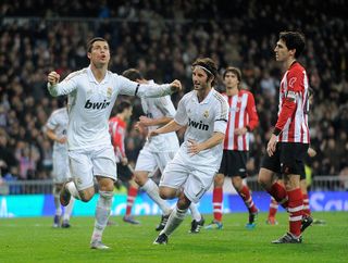 Cristiano Ronaldo (L) of Real Madrid celebrates with Esteban Granero after scoring Real's 3rd goal during the La Liga match between Real Madrid and Athletic Bilbao at estadio Santiago Bernabeu on January 22, 2012 in Madrid, Spain.