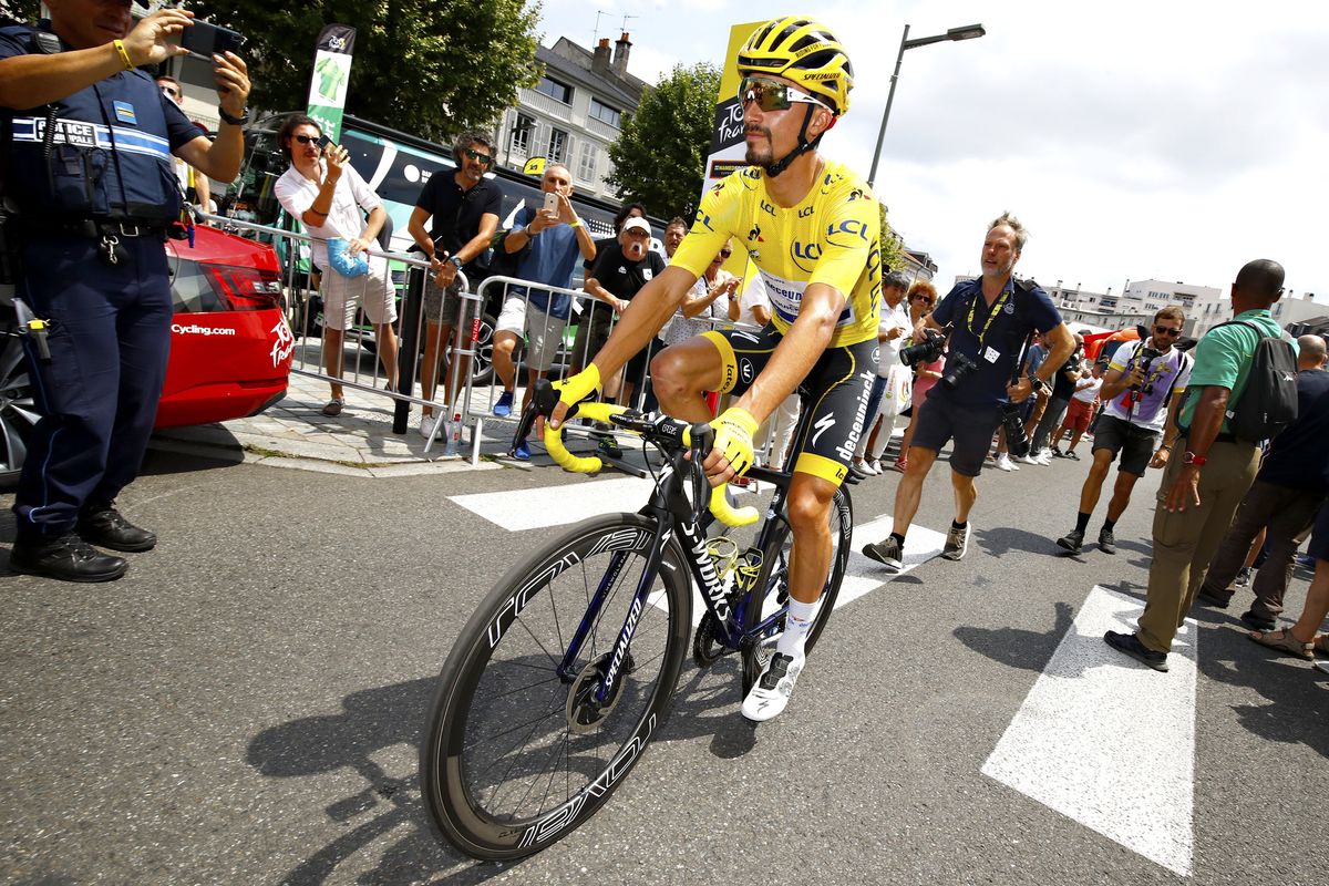 Julian Alaphilippe (Deceuninck-QuickStep) heads to the start of stage 14