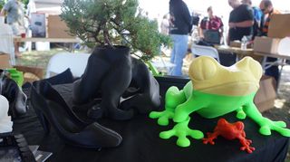 Frogs, pots and shoes are among the objects made by 3D printing hobbyists at Maker Faire's 3D printing stage.