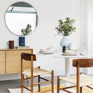 patsy mirror with wooden drawers and wooden chair