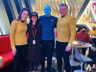 scene from the set of 'Star Trek: Strange New Worlds' showing director valerie weiss with three castmates