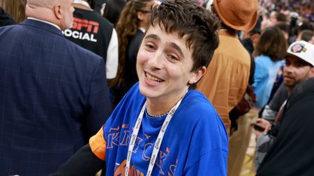Timoth&eacute;e Chalamet celebrates on the court after the Knicks won the NBA Championship.