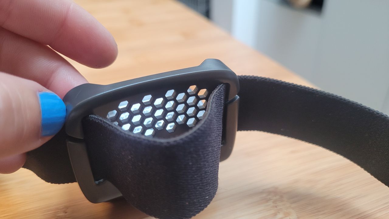 The rear of the headlamp bracket with hexagon cutouts to help dissipate heat from your head