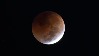 The Moon is seen during a total lunar eclipse, Tuesday, Nov. 8, 2022, at NASA’s Kennedy Space Center in Florida.