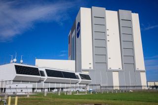 Exterior view of the Rocco A. Petrone Launch Control Center (left), next to the Vehicle Assembly Building at NASA's Kennedy Space Center in Florida.