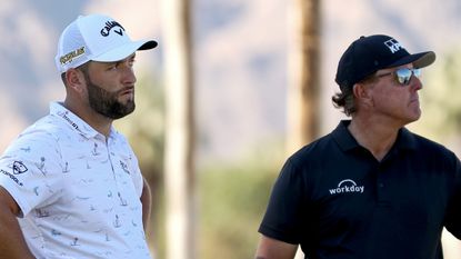 Jon Rahm and Phil Mickelson at the 2022 American Express PGA Tournament