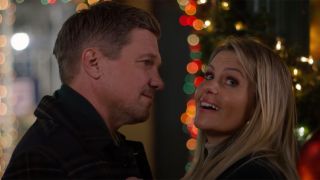 Candace Cameron Bure and Marc Blucas in the trailer for A Christmas... Present.