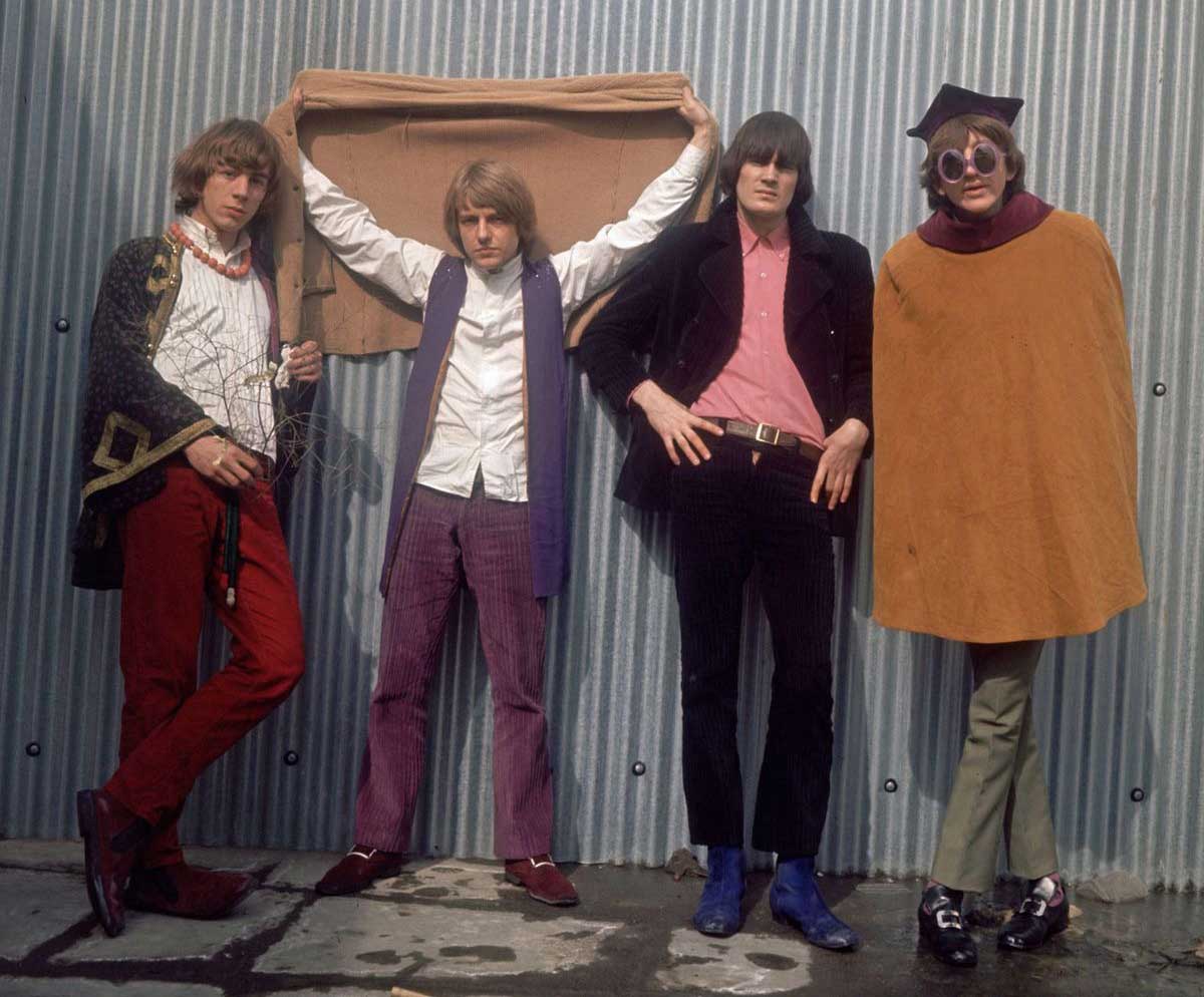 Soft Machine pictured against a corrugated iron fence, 1967