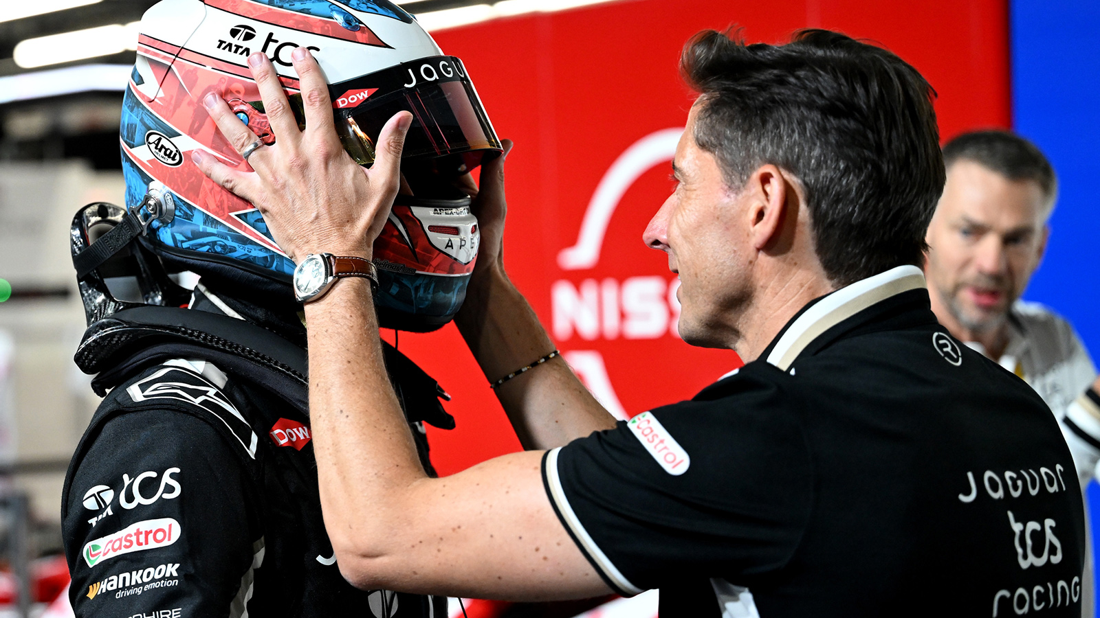 Mitch Evans of New Zealand and Jaguar TCS Racing and Ian James, Team Principal of Jaguar TCS Racing celebrate winning the team championship during the London E-Prix