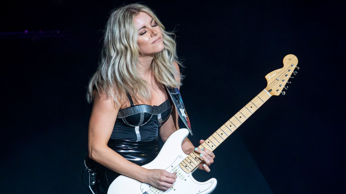 Lindsay Ell performs at DTE Energy Music Theater in support of &quot;Beers On Me&quot; tour on October 07, 2021 in Clarkston, Michigan.